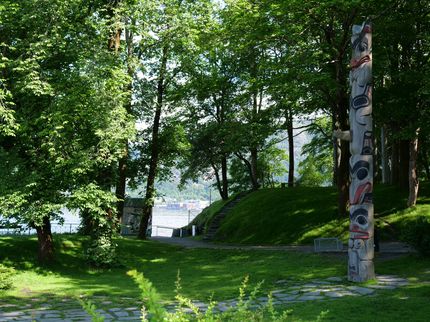 A view of the Nordnes Park in Bergen. Sunny weather and green trees.