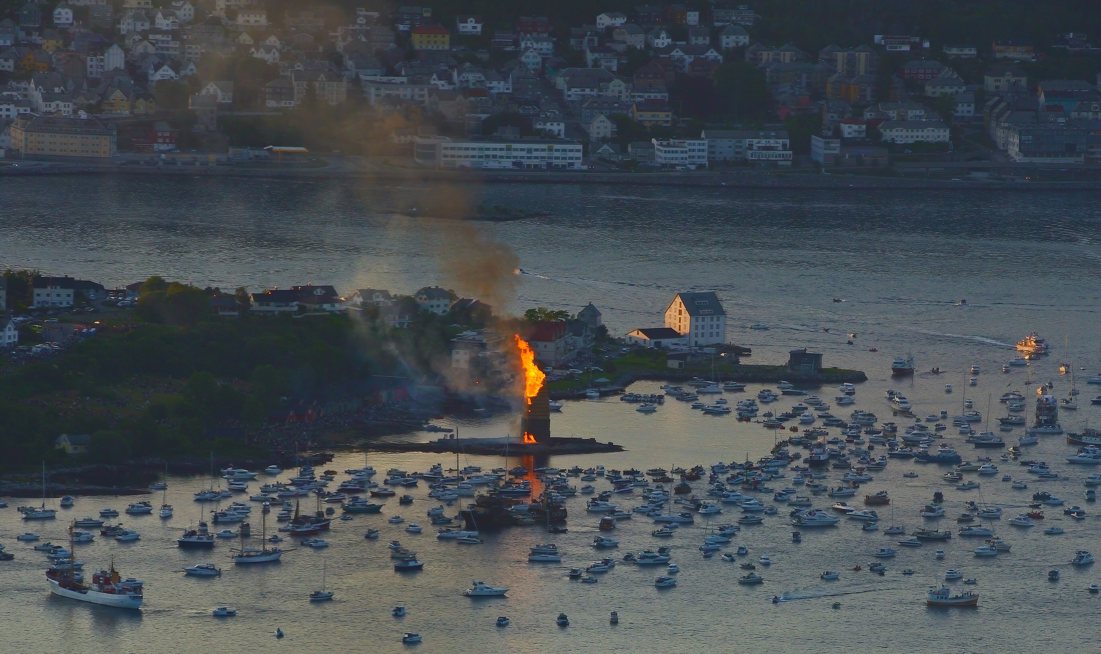 The midsummer bonfire in Ålesund, Norway. Kaushik jayasayee, CC BY-SA 4.0 <https://creativecommons.org/licenses/by-sa/4.0>, via Wikimedia Commons 
